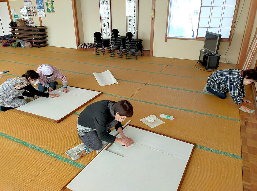写真：吉島ボランティア会による清掃の様子